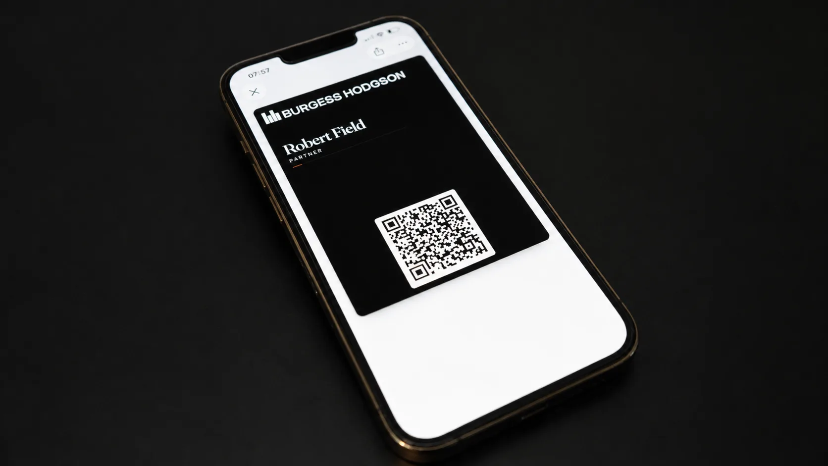 Burgess Hodgson Apple Wallet business card on an iPhone