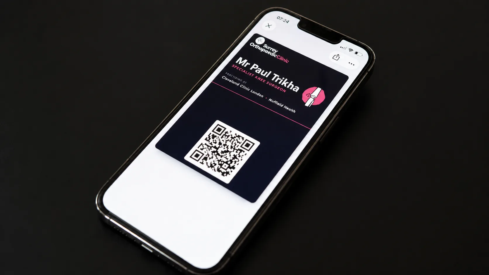 Surrey Orthopaedic Clinic Apple Wallet business card on an iPhone