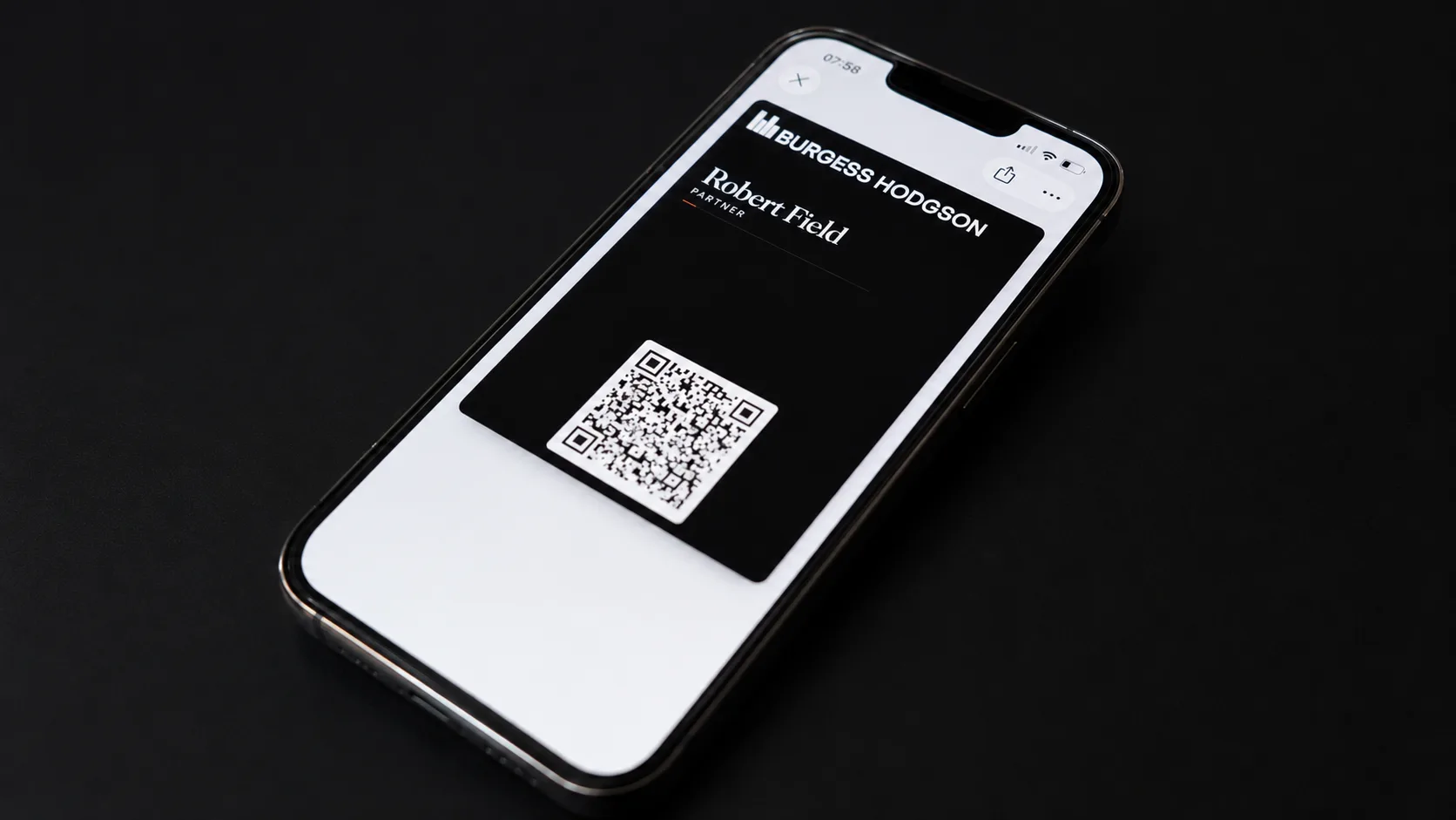 Burgess Hodgson Apple Wallet business card on an iPhone